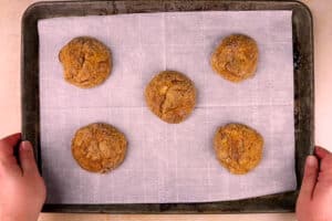 pumpkin cheesecake cookies baked on baking tray