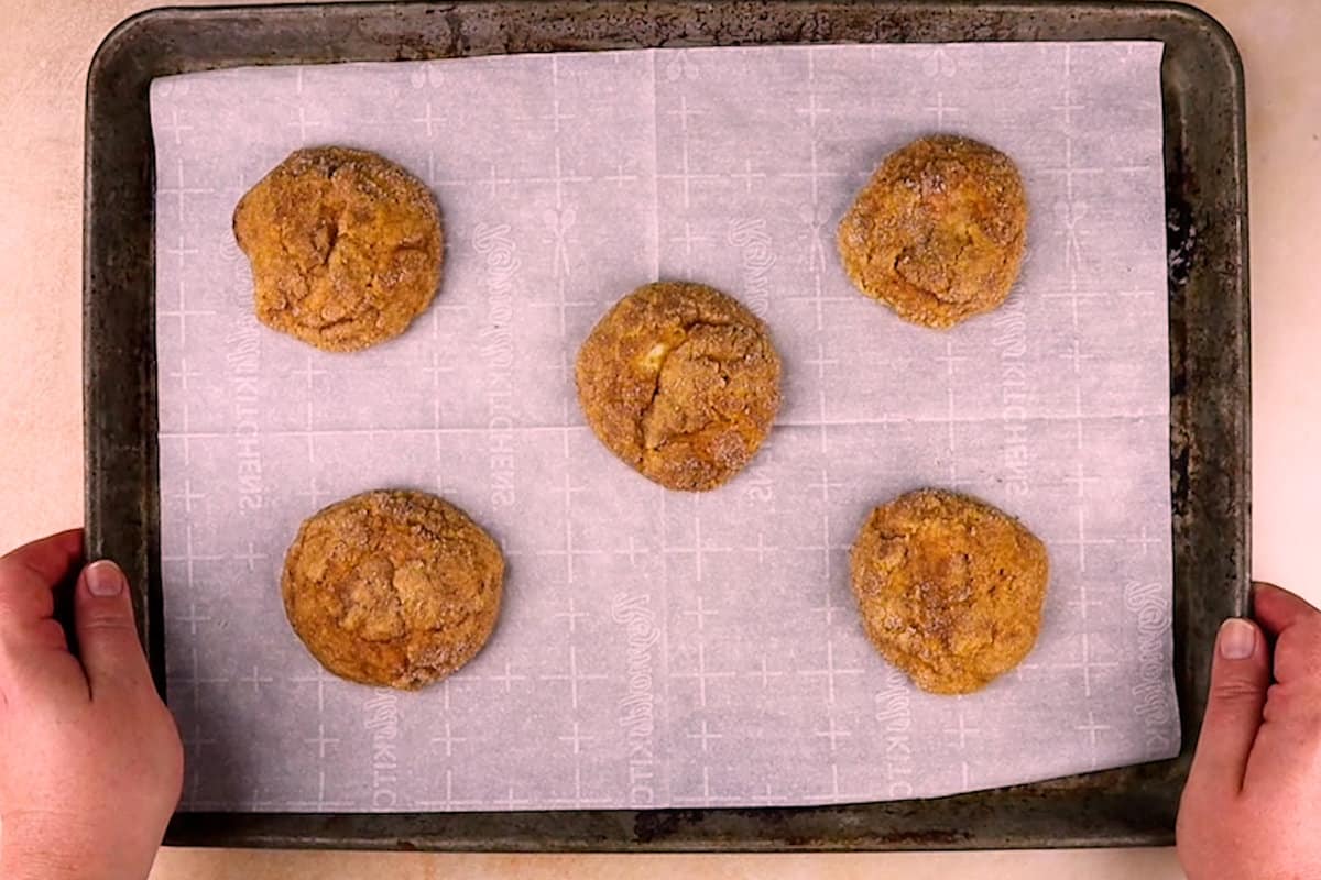 pumpkin cheesecake cookies baked on baking tray