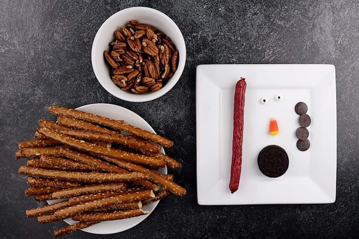 Ingredients for Turkey Cheese Ball (pretzels, face and neck items, pecans)