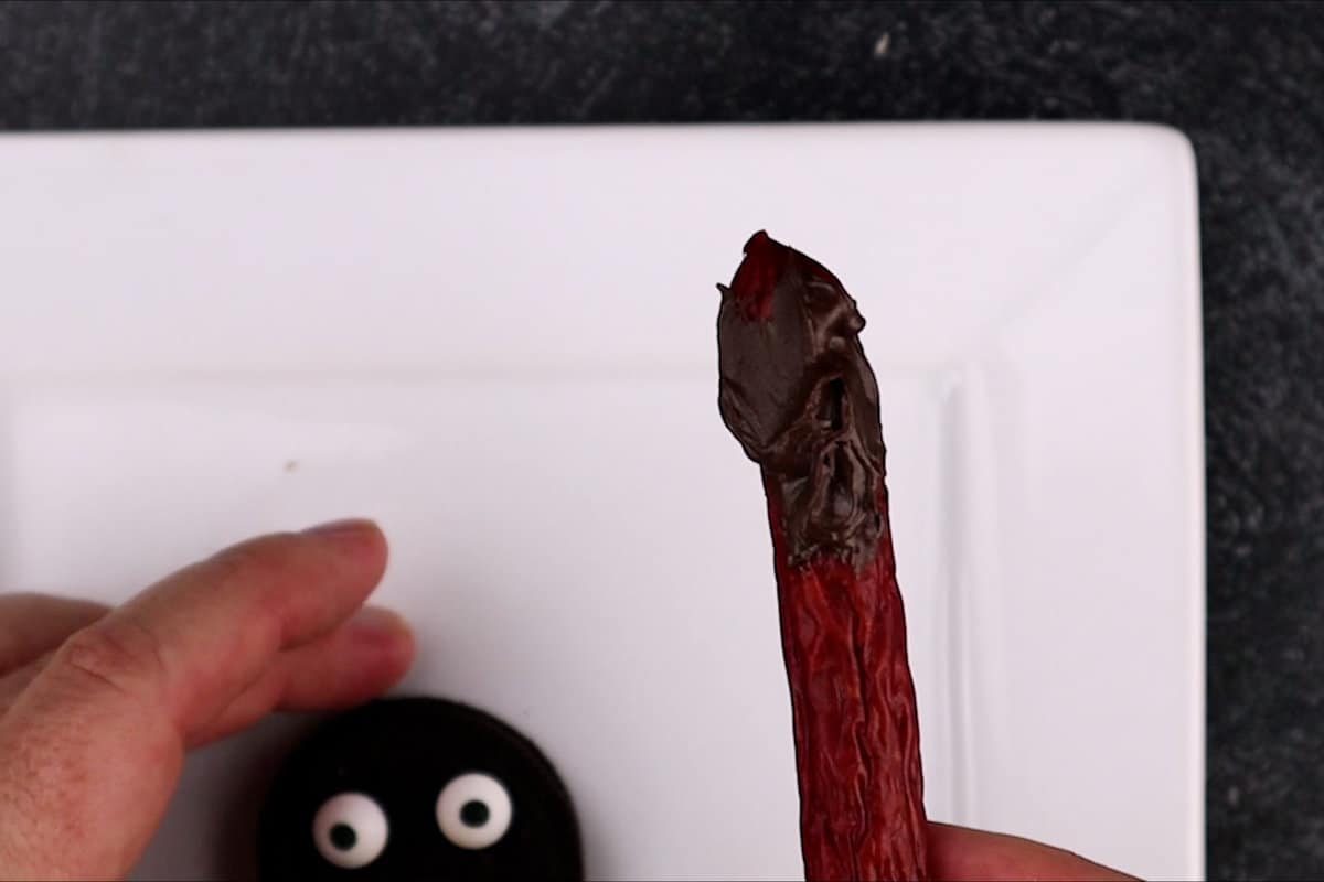 adding candy melt to meat stick