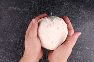 shaping cream cheese into a ball