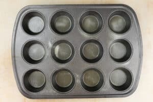 greased cupcake tin