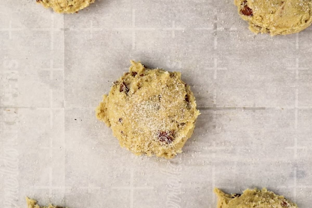 sprinkling raw sugar on cookies