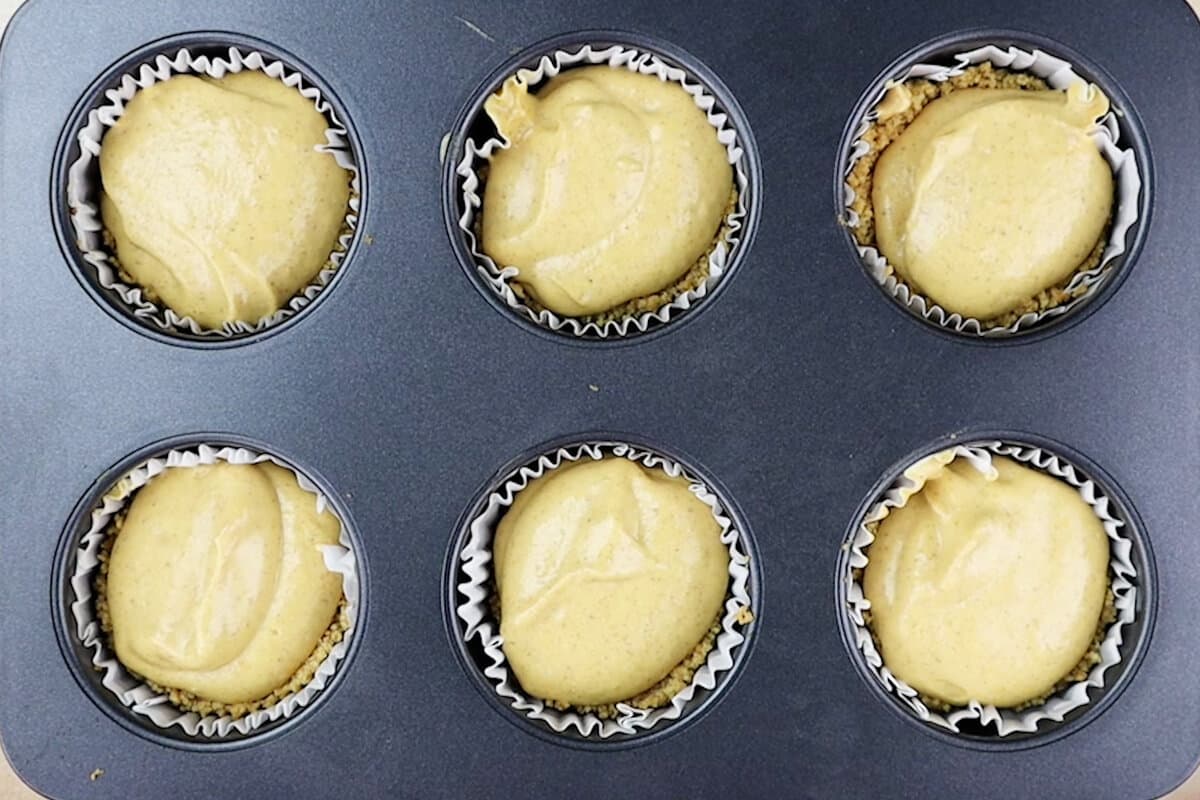 mini pumpkin cheesecakes before baking