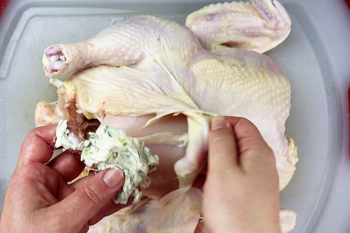 adding butter under skin