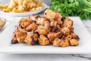 Grilled Chicken Nuggets piled on plate