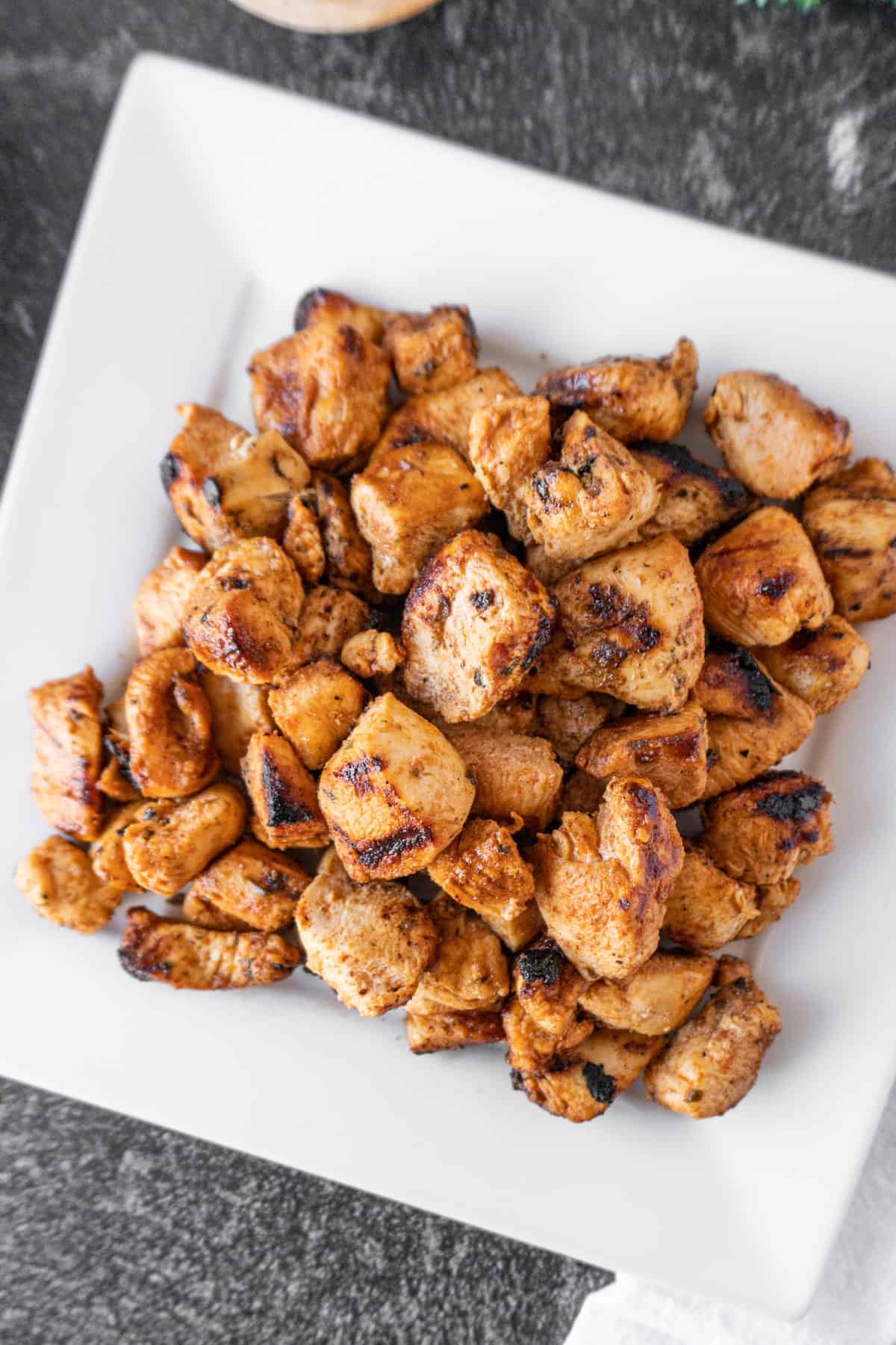 Grilled Chicken Nuggets on white plate