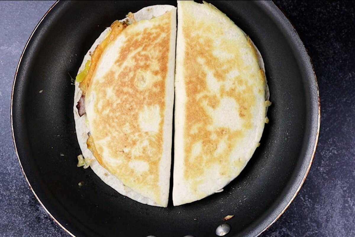 browned quesadillas in pan