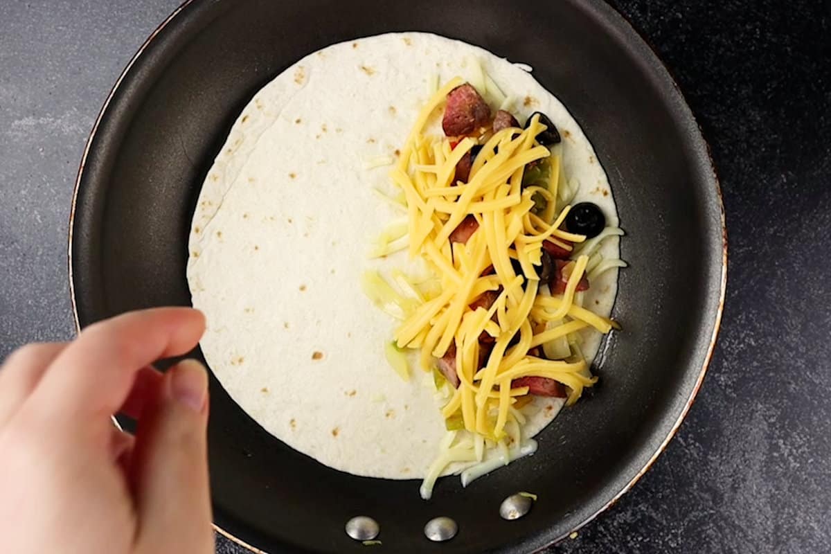 adding ingredients to tortillas