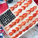 Flag cake surrounded by 4th of July decorations