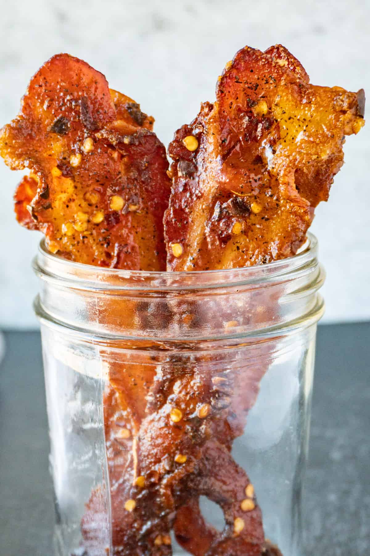 brown sugared bacon in a jar