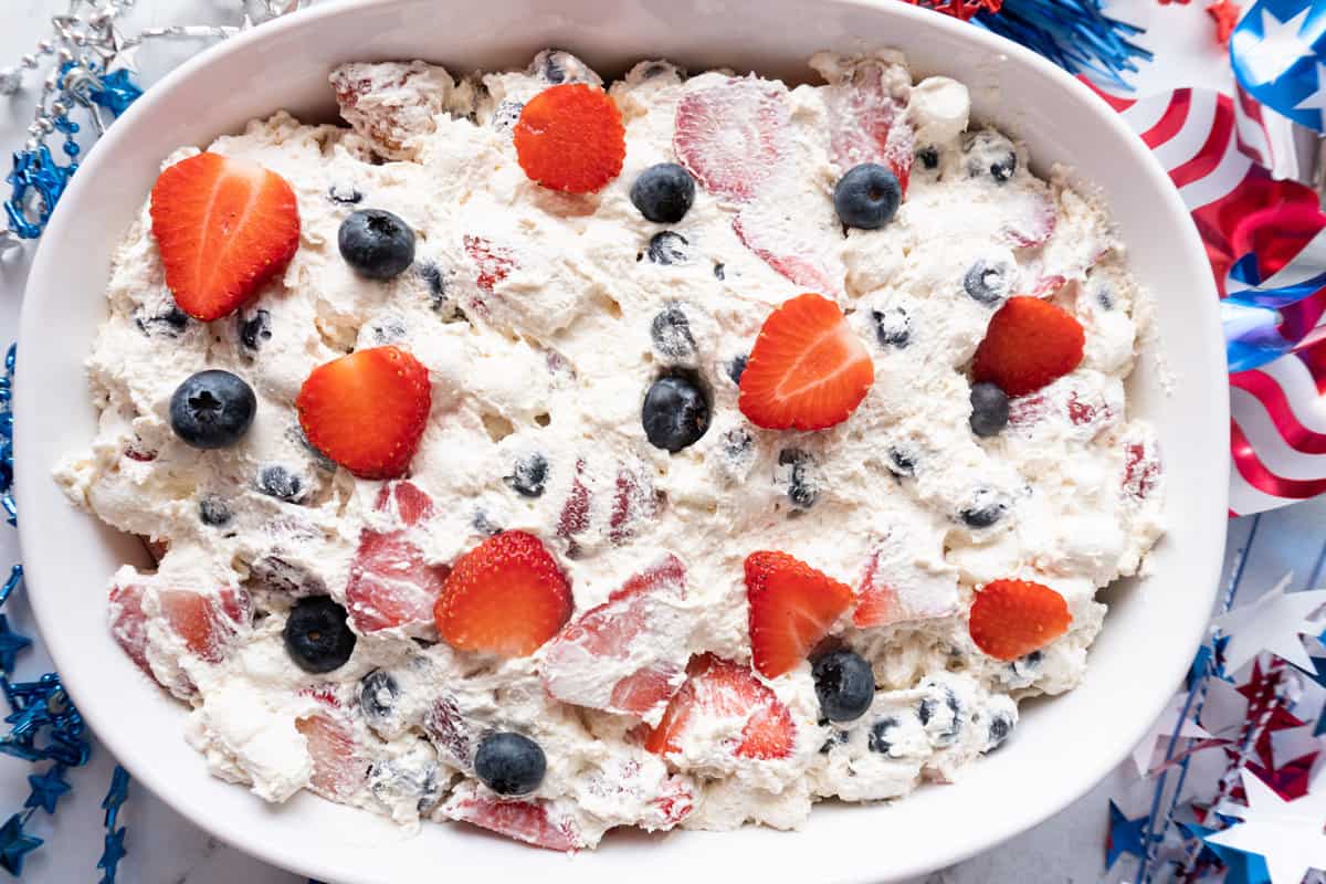 red white and blue cheesecake salad in white dish horizontal image