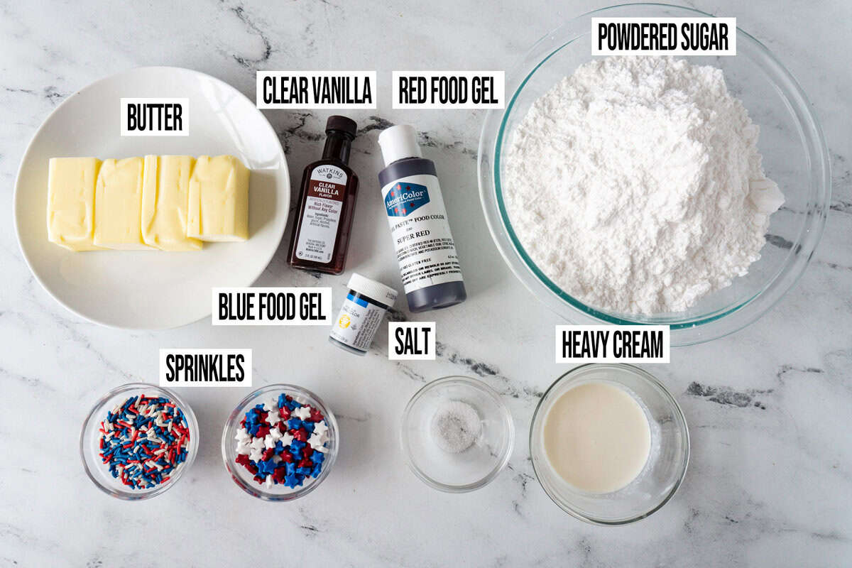 Ingredients for red, white, and blue cake frosting in individual bowls and labeled.