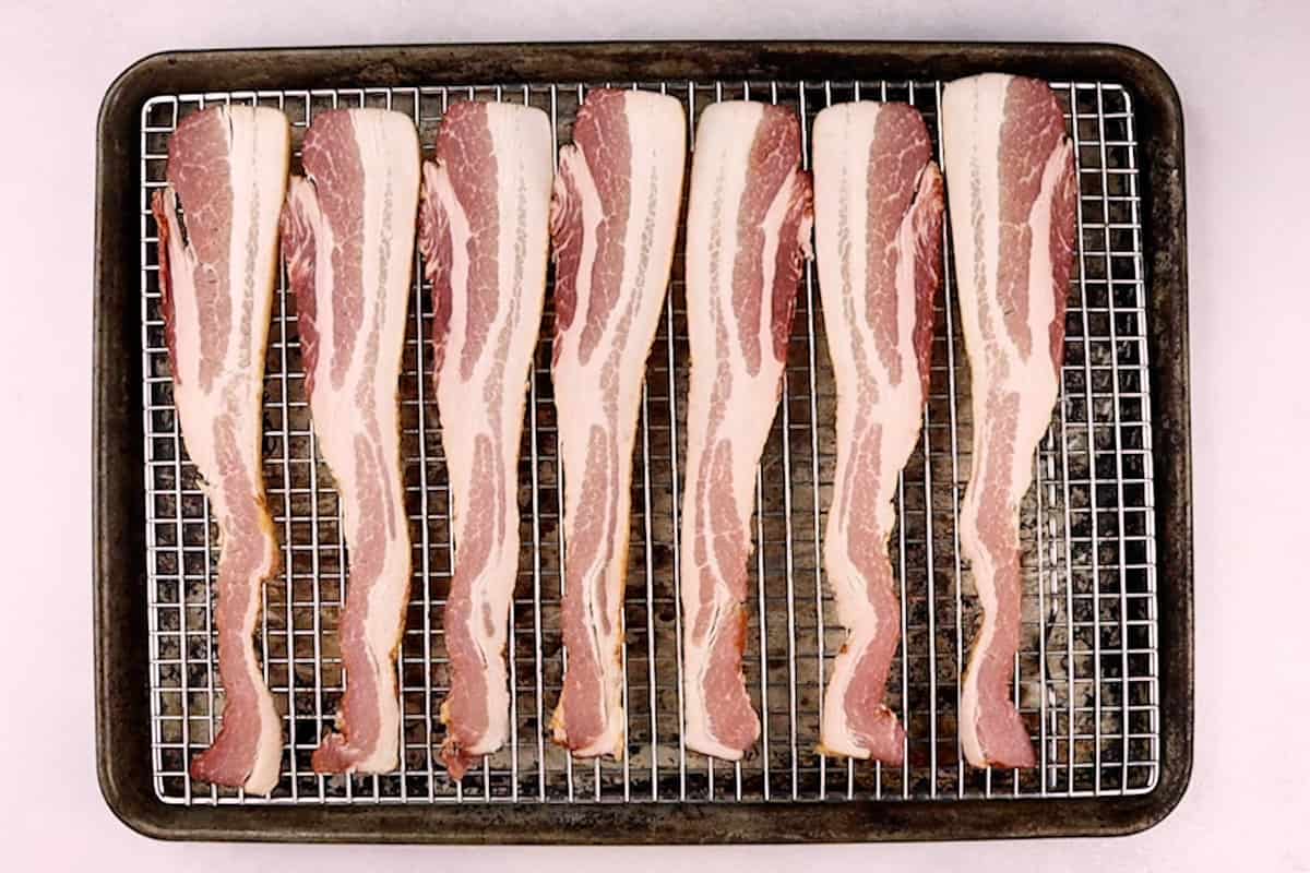 raw bacon on wire rack