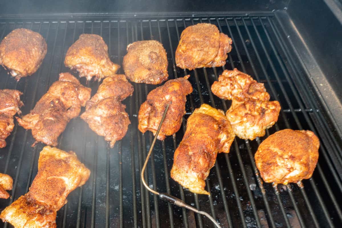cooked chicken thighs on smoker
