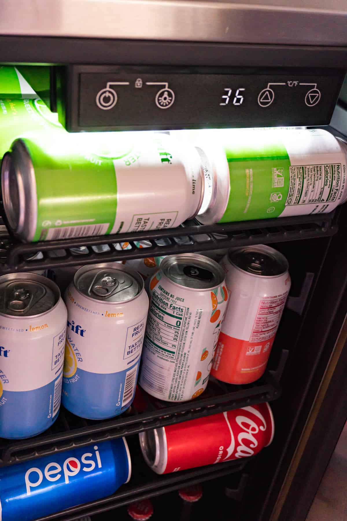 close up of open newair beverage fridge