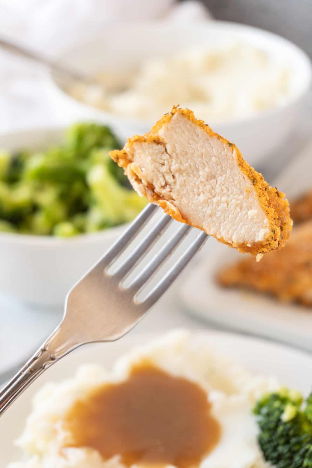 slice of chicken on fork