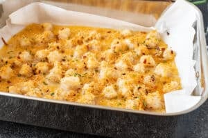 baked scallops in roasting pan horizontal image