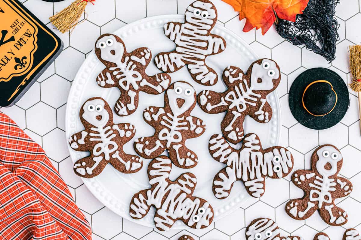 gingerbread cut out skeleton cookies on plate