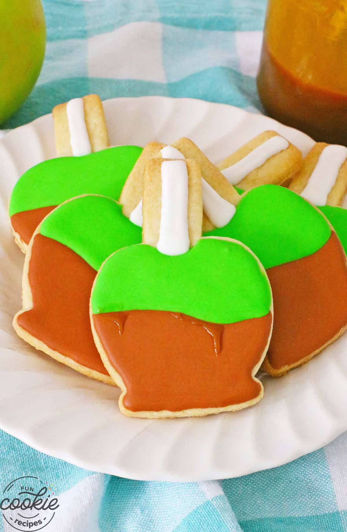 sugar cookies decorated to look like candy apples