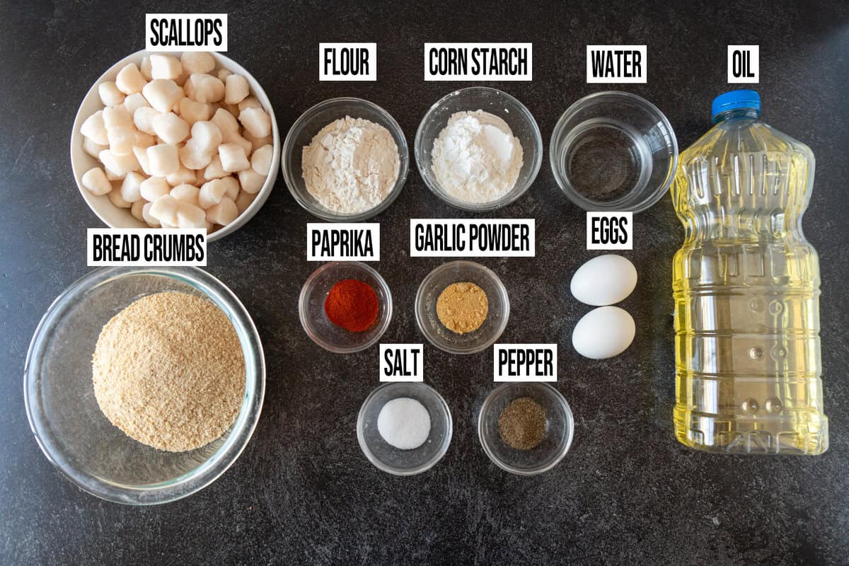 fried scallops ingredients in individual dishes. 