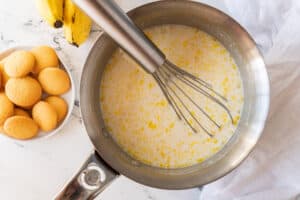 whisking all ingredients together in saucepan