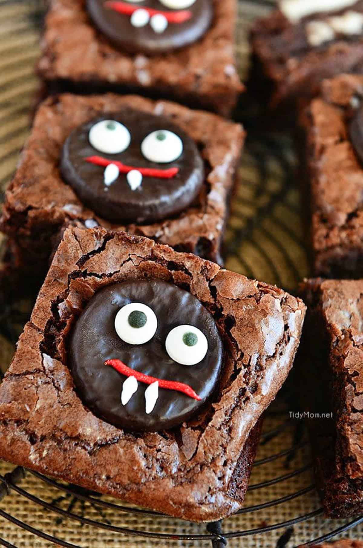 brownies with peppermint patties decorated to look like vampires