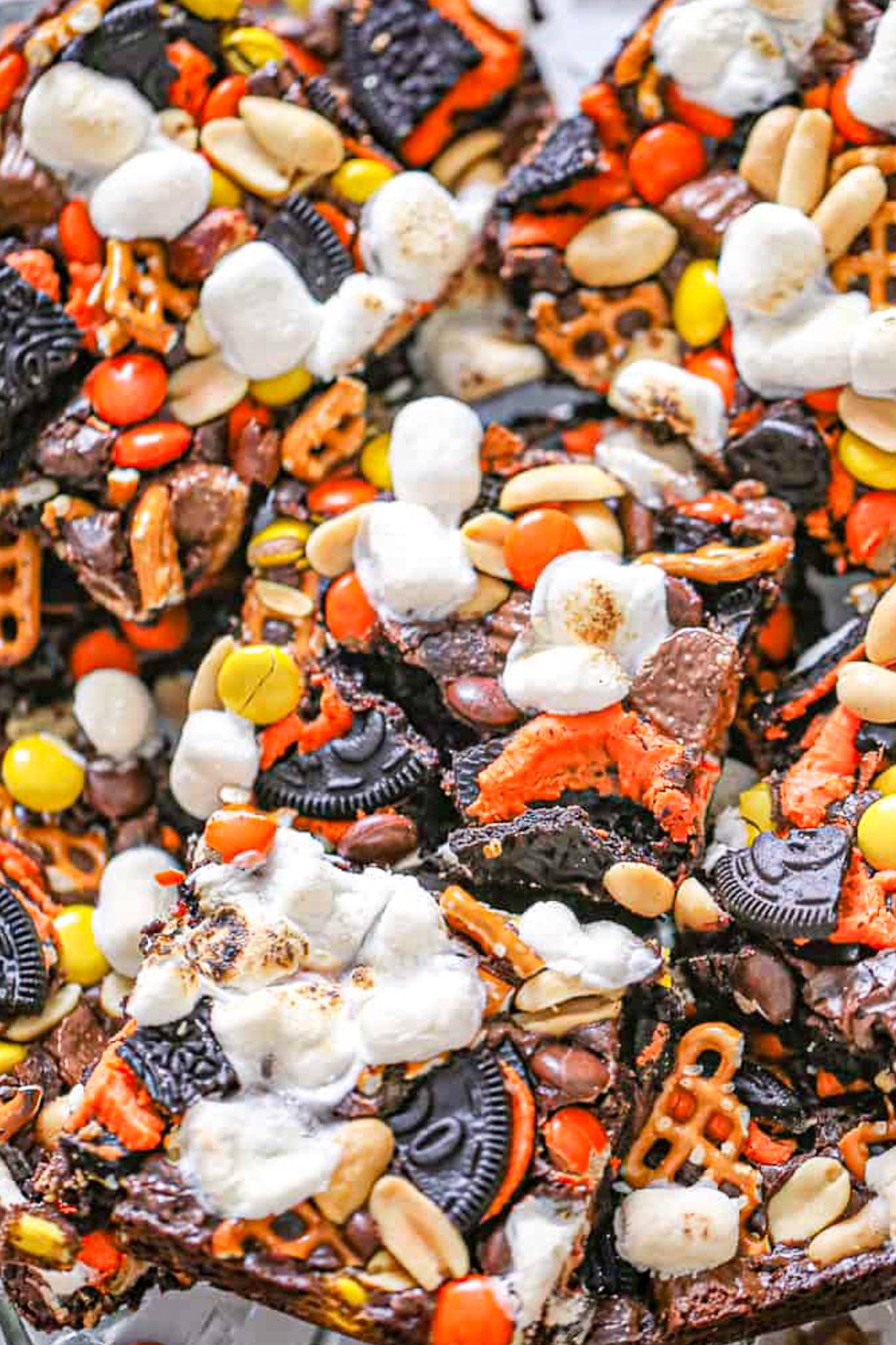 brownies loaded with Halloween candy and pretzels