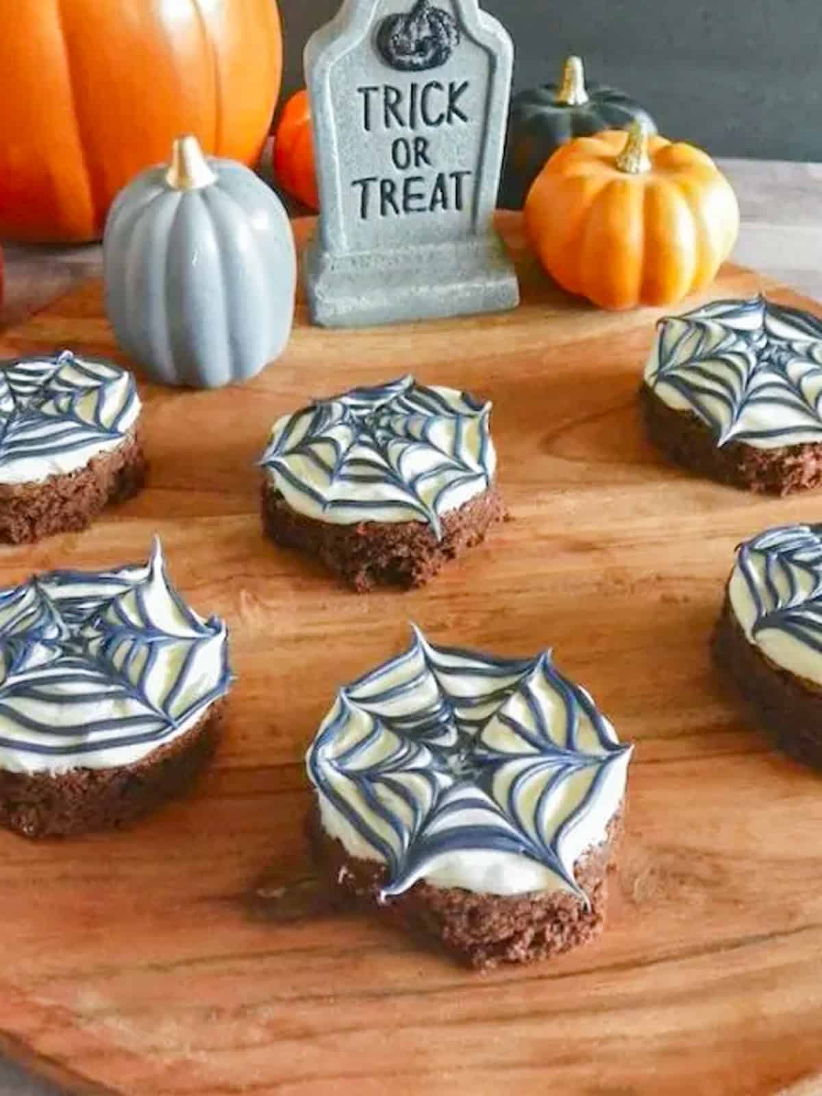 round brownies decorated to look like spiderwebs