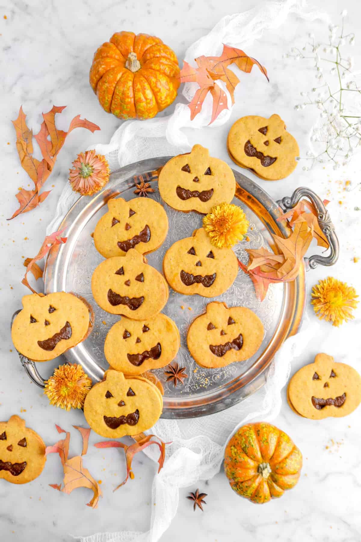 jack o lantern pumpkin cookies on plate