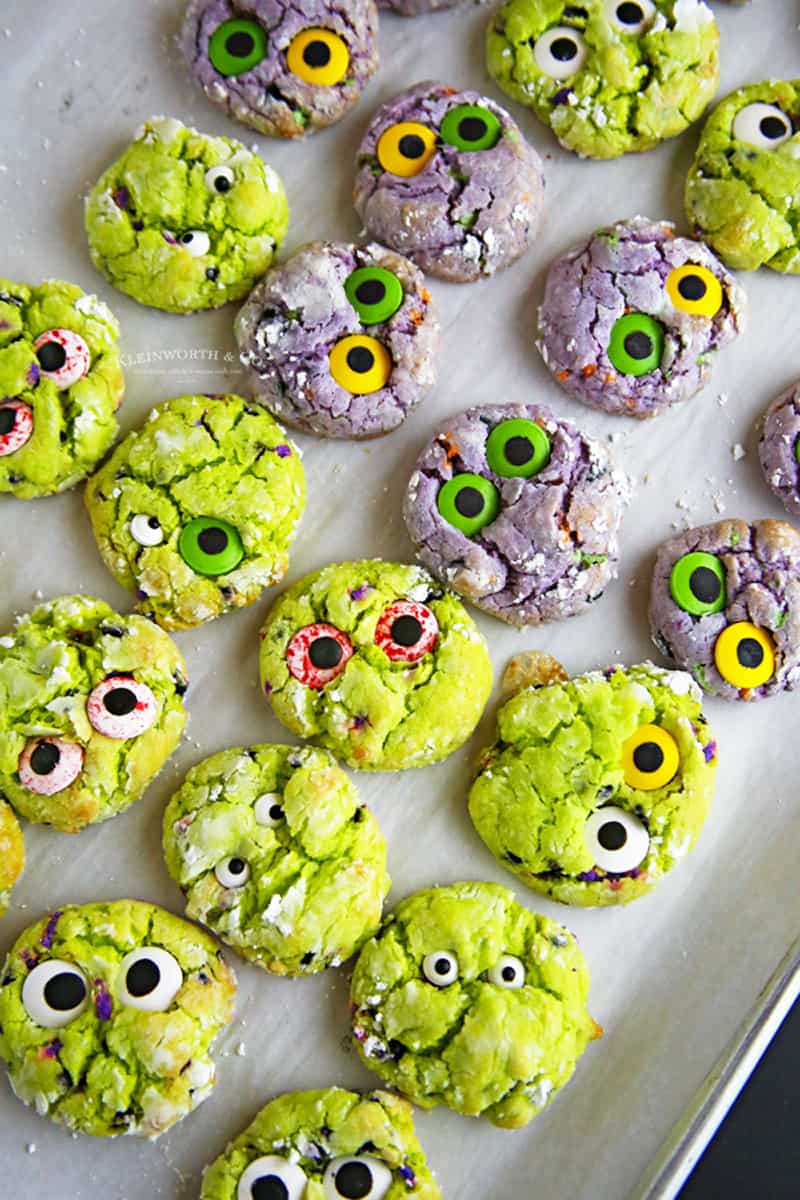 green and purple cookies with large eyes