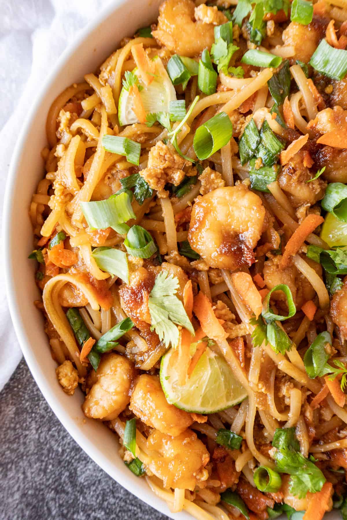 close up of shrimp pad thai in bowl