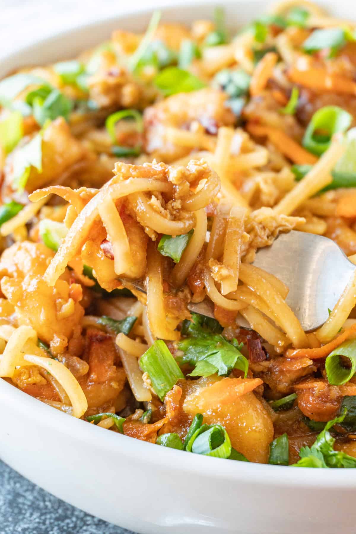 shrimp pad thai on fork