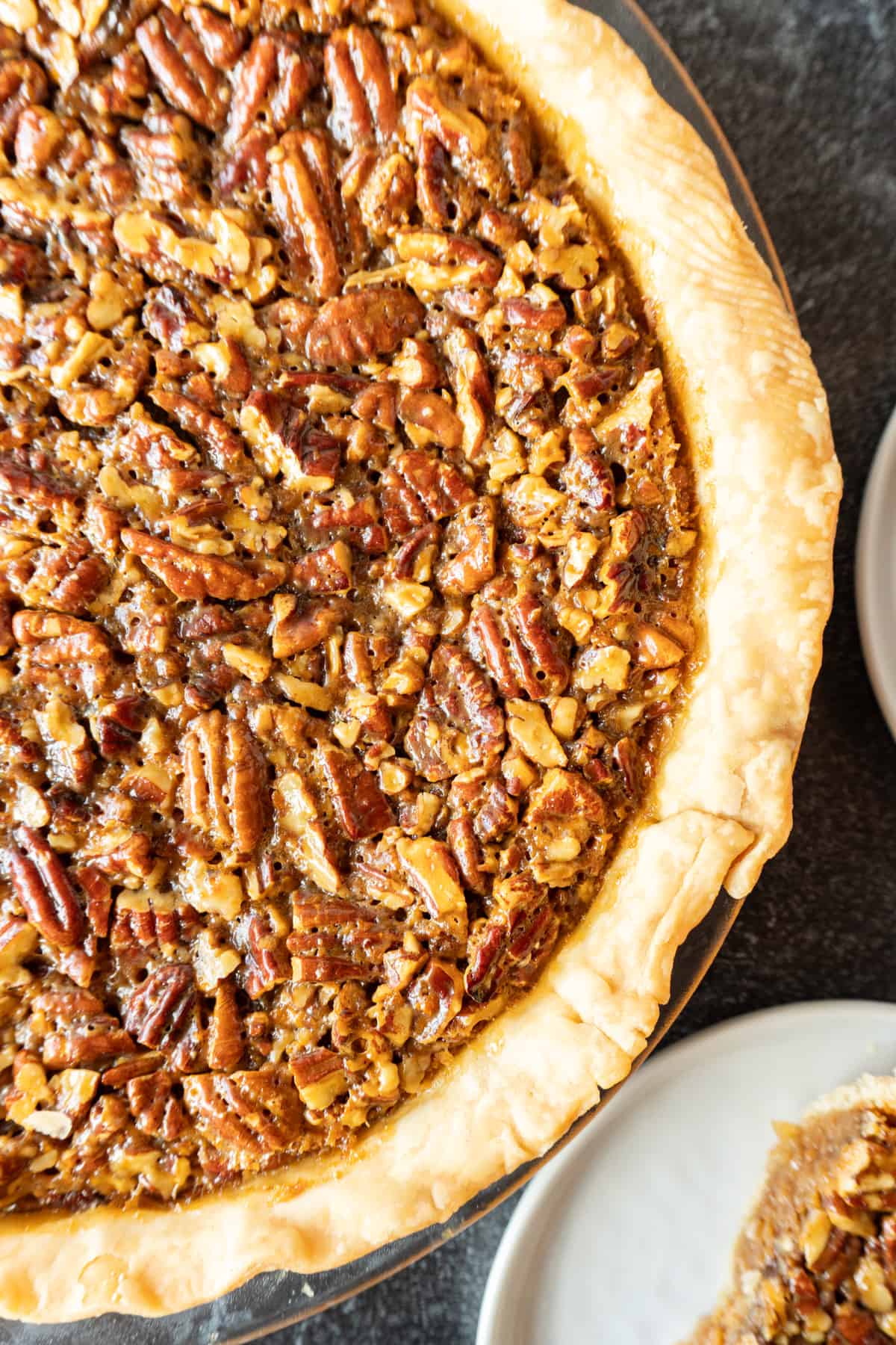 caramel pecan pie close up of whole pie