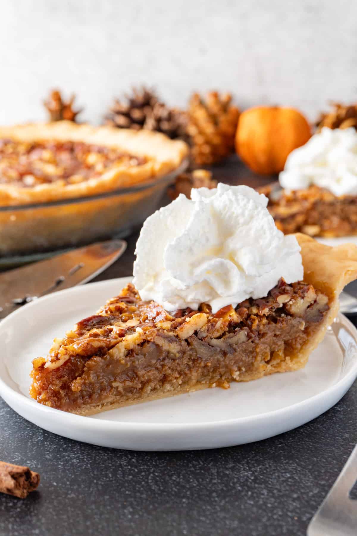 caramel pecan pie slice on plate