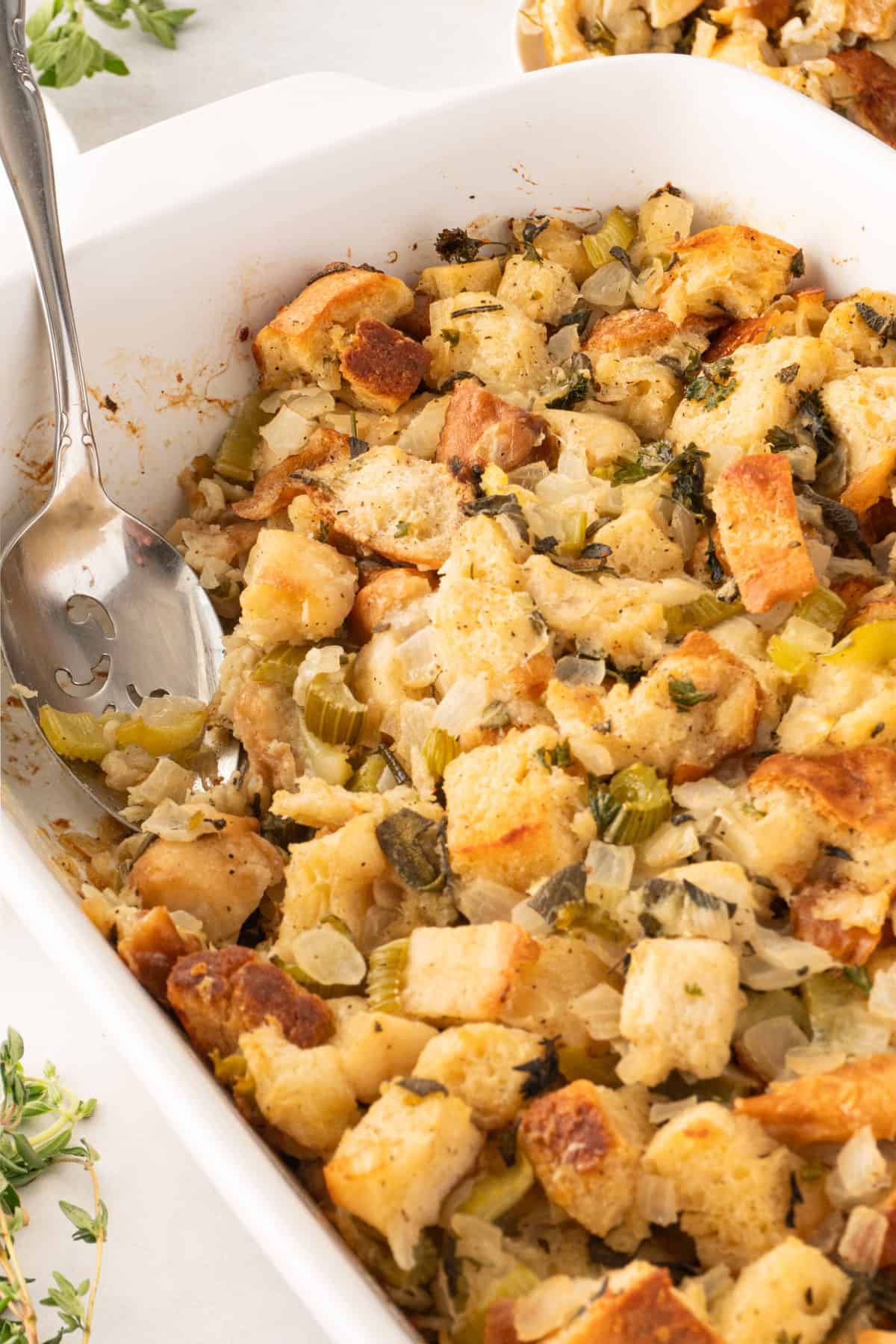 Homemade Stuffing in dish with spoon