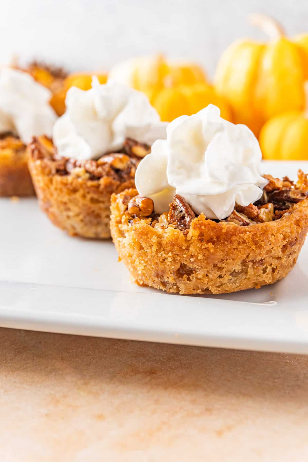 pecan tart with whipped cream