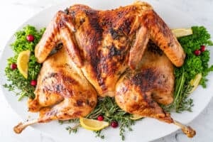 spatchcock turkey on platter horizontal imge