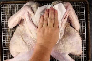 patting turkey dry