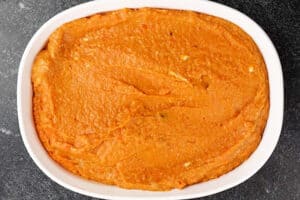 sweet potato souffle filling in baking dish