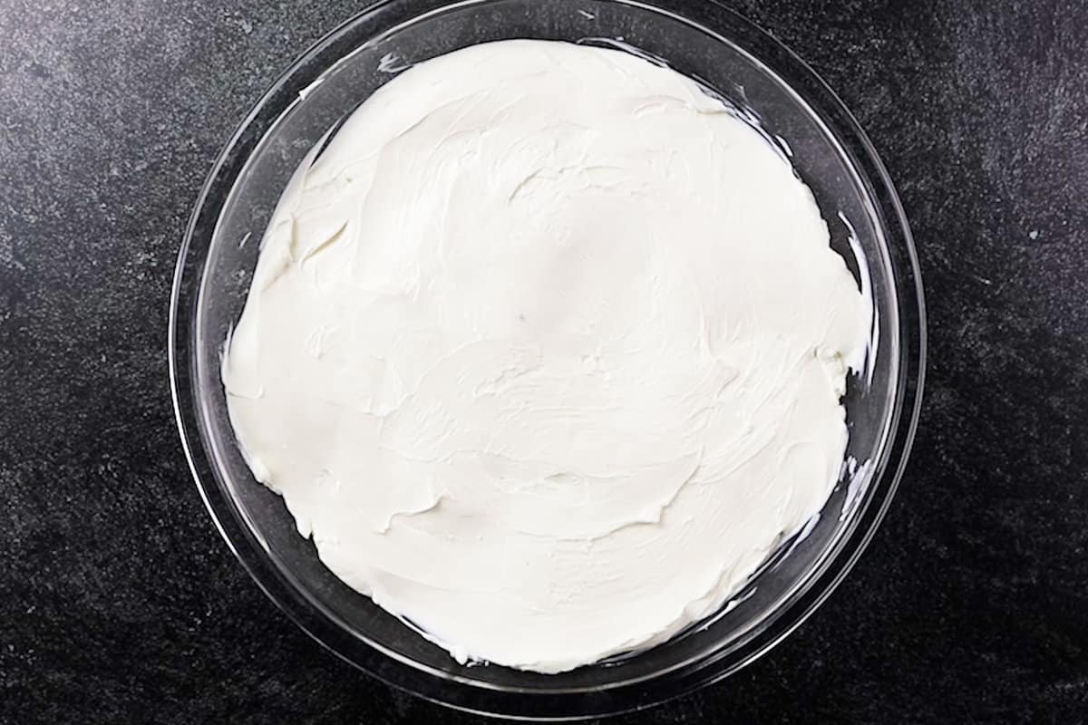 cream cheese spread into pie dish
