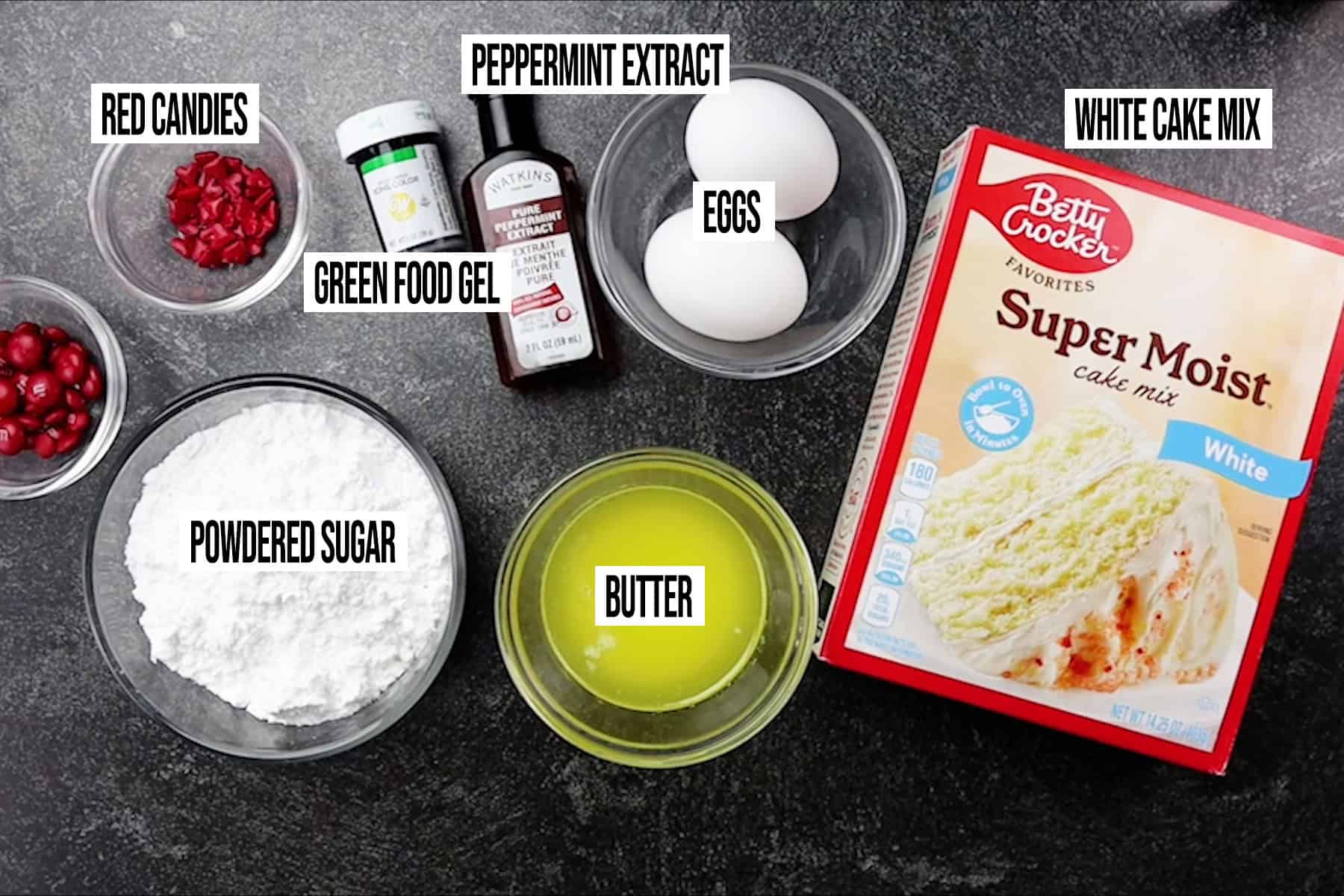 Grinch Cookie Ingredients in individual bowls and labeled.