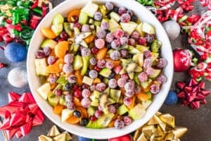 Christmas fruit salad in white bowl