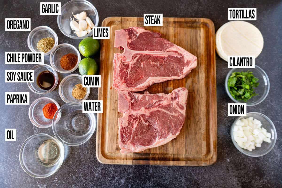 Mexican street tacos ingredients laid out and labeled.