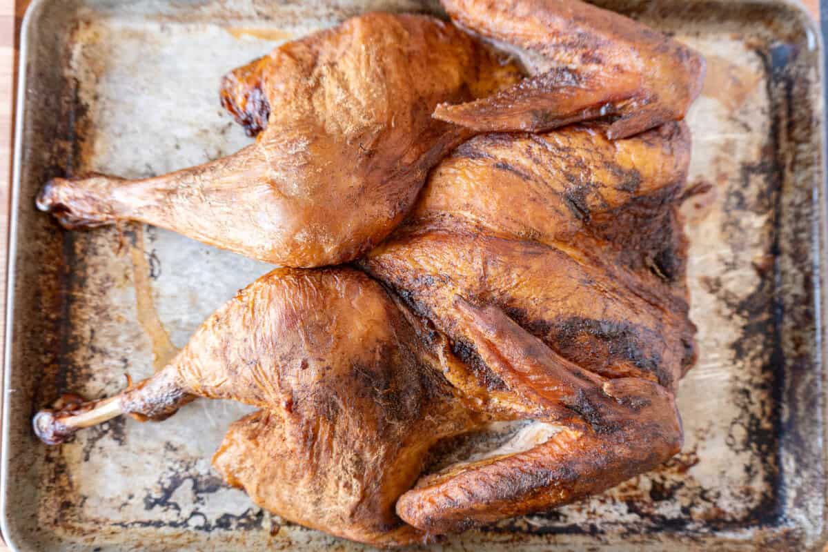 smoked turkey on a baking sheet. before adding glaze.