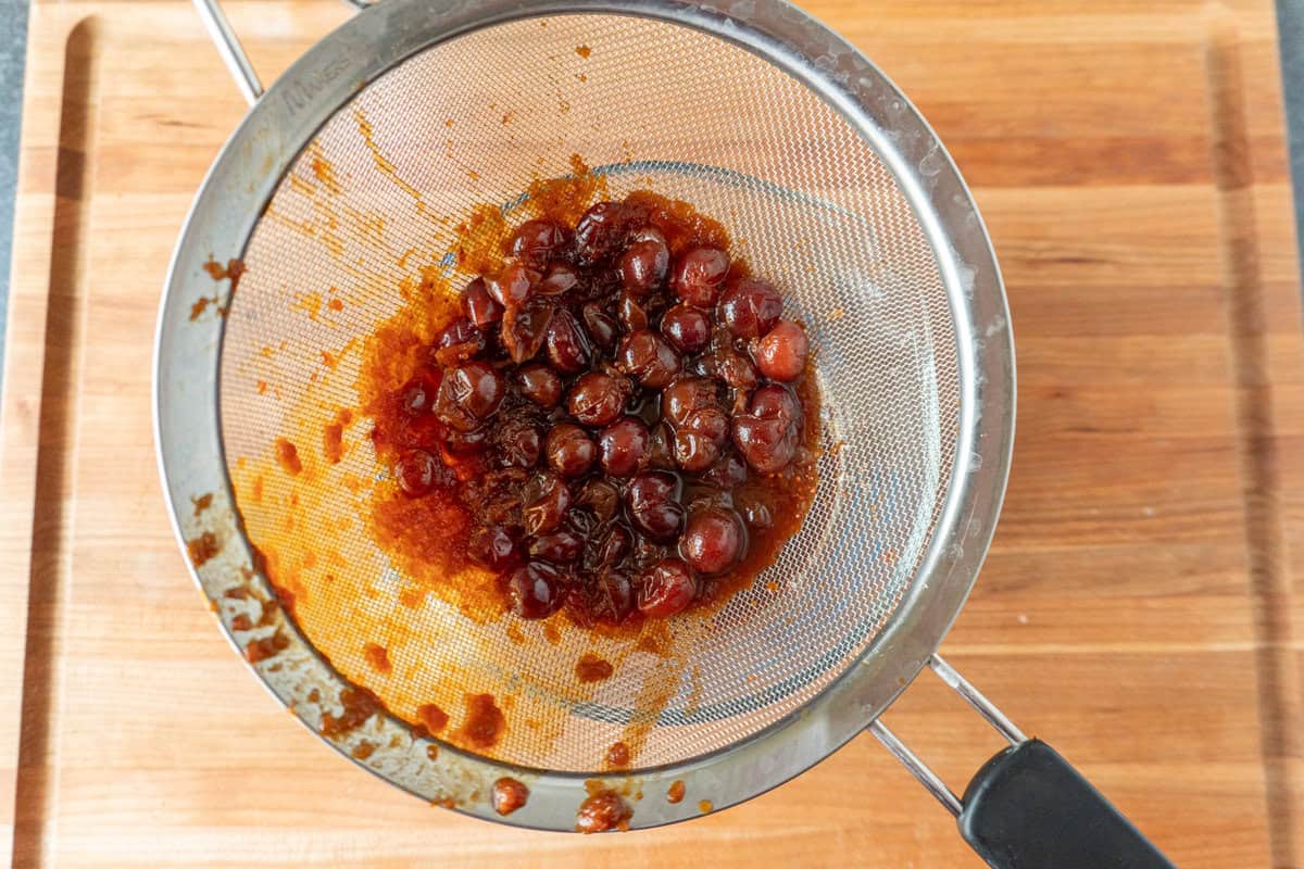 straining glaze with a large round strainer.