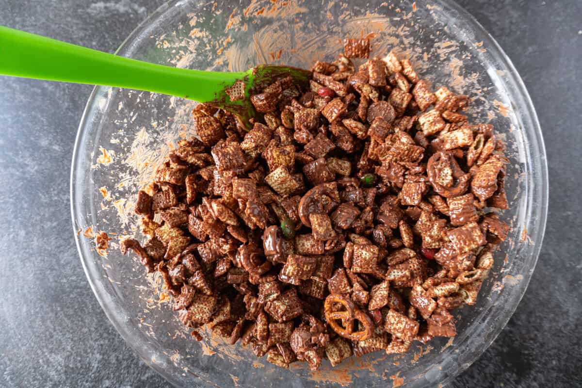 chex mix and cereal mixed in bowl