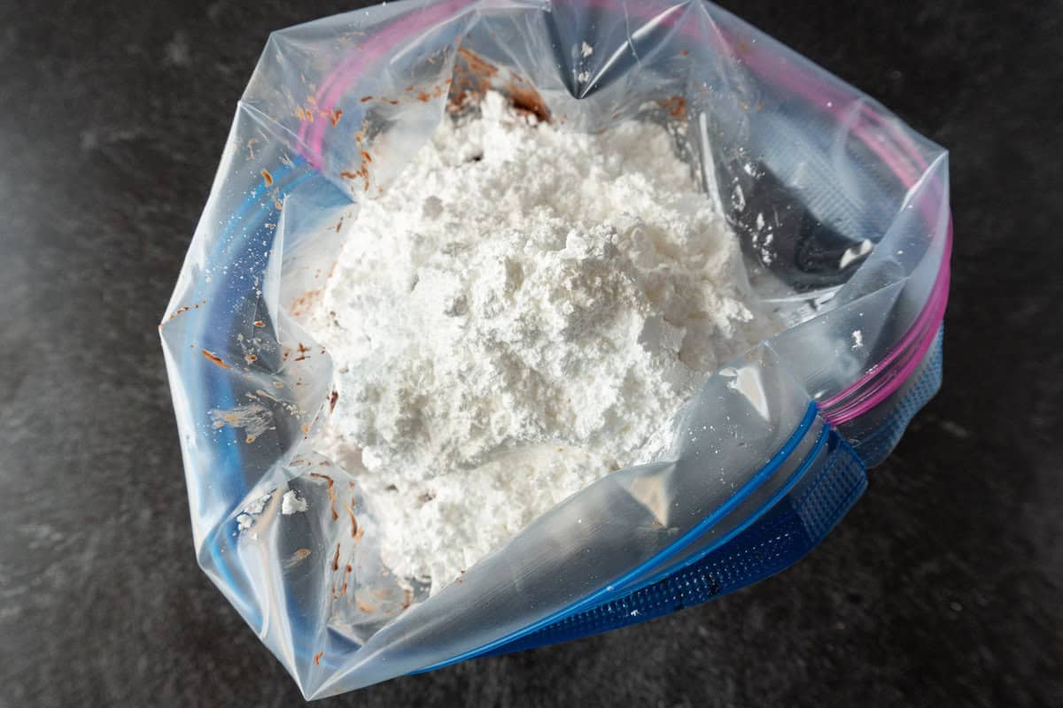 powdered sugar added to bag