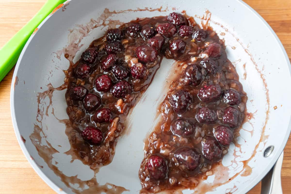 blackberry sauce simmered and thickened in pan.