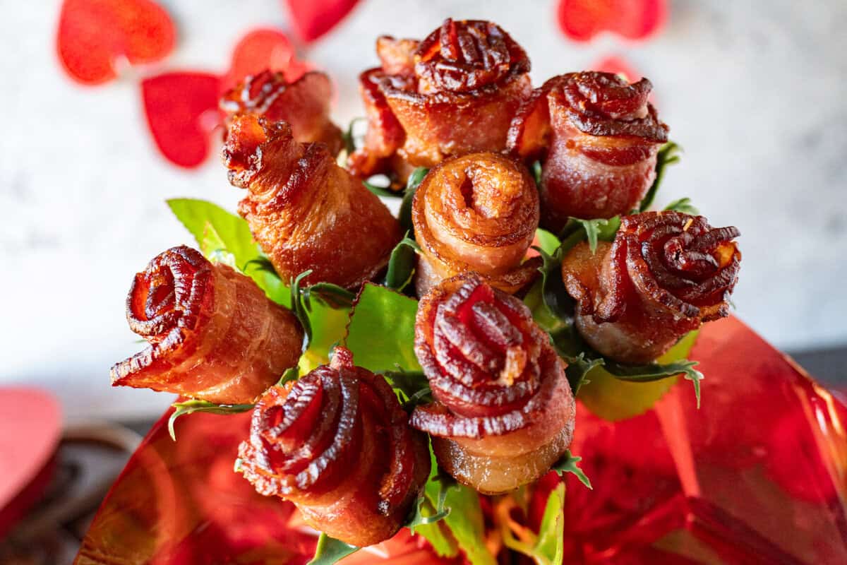 bouquet of bacon roses with heart streamer.